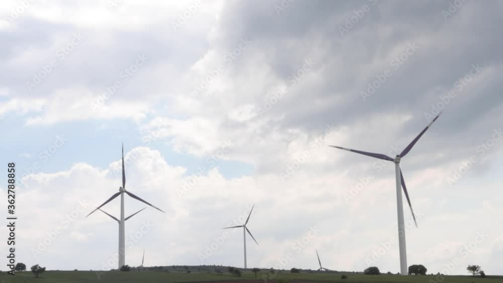 Rotating Wind Turbines On Field Rotating Wind Turbines On Field