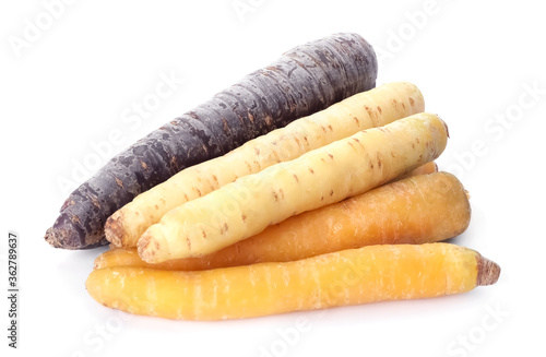 Different tasty raw carrots isolated on white