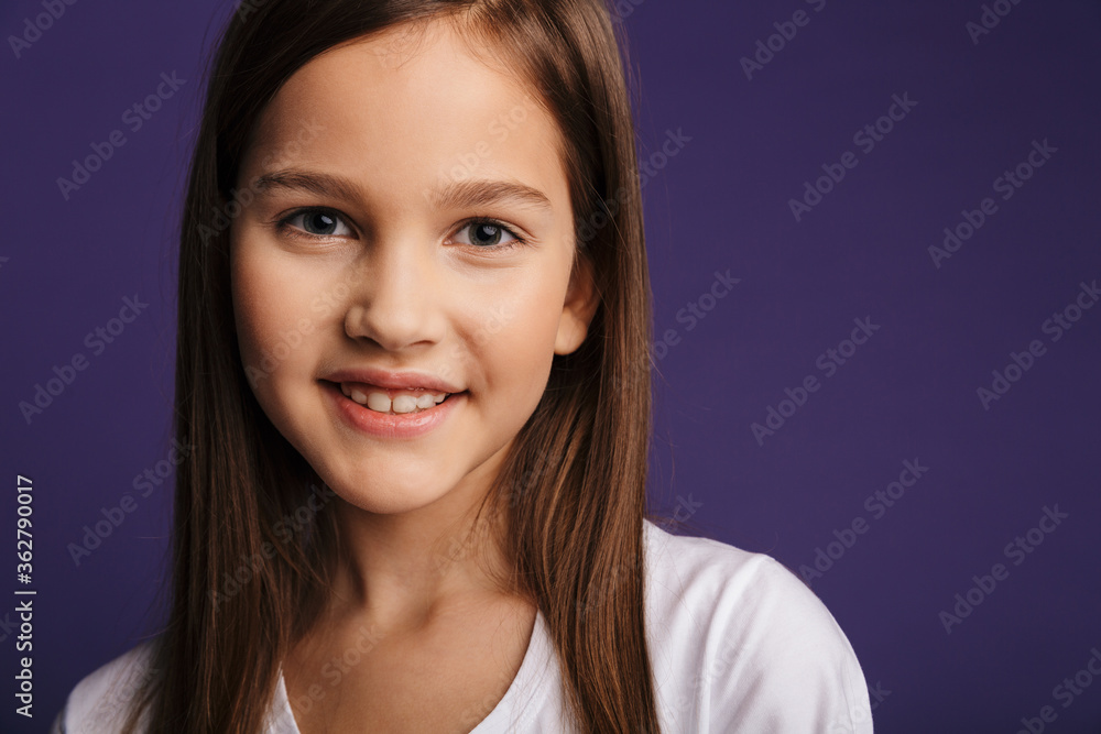 Photo of cheerful beautiful girl smiling and looking at camera Photo of cheerful beautiful girl smiling and looking at camera