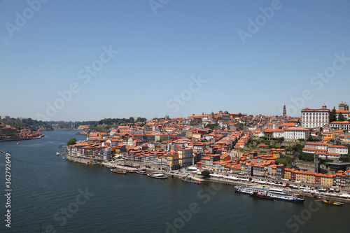 Sights and scenes of Porto in Portugal, featuring buildings, river and roads