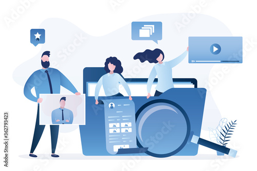 Big folder and various people with media content. Users searching files and information. Online data storage, cloud computing.