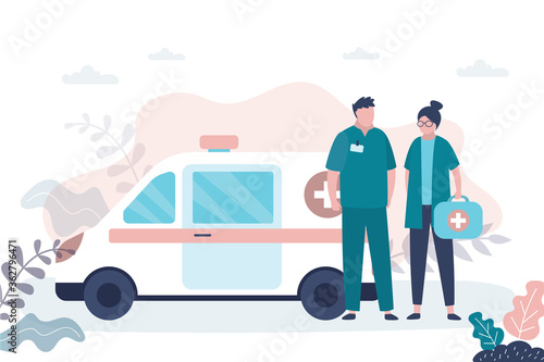 Man and woman doctors near ambulance van. Medical services concept. Emergency, medical transport and staff in professional uniform. First aid