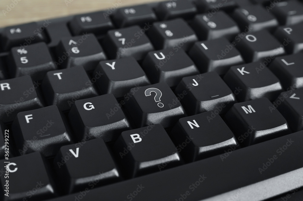 Question mark sign icon on black computer keyboard button, Business customer service and support online concept Question mark sign icon on black computer keyboard button, Business customer service and support online concept