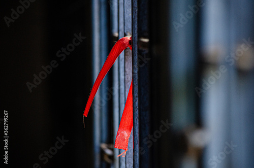 red cable on black railing