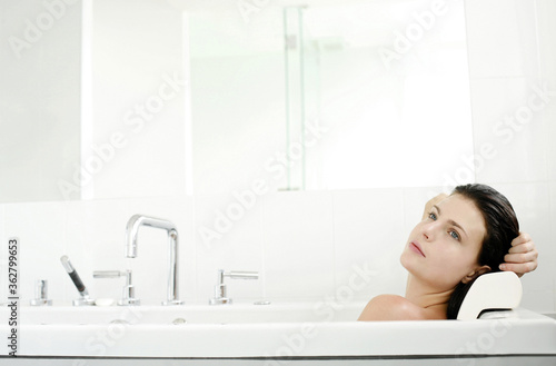 Woman relaxing in the bathtub