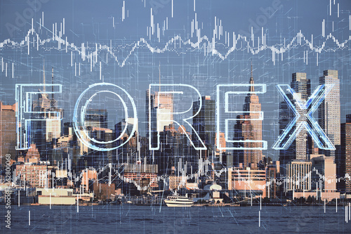 Forex graph on city view with skyscrapers background double exposure. Financial analysis concept. © peshkova