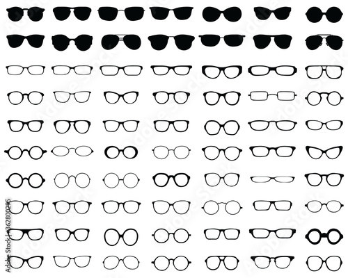 Black silhouettes of different eyeglasses on a white background