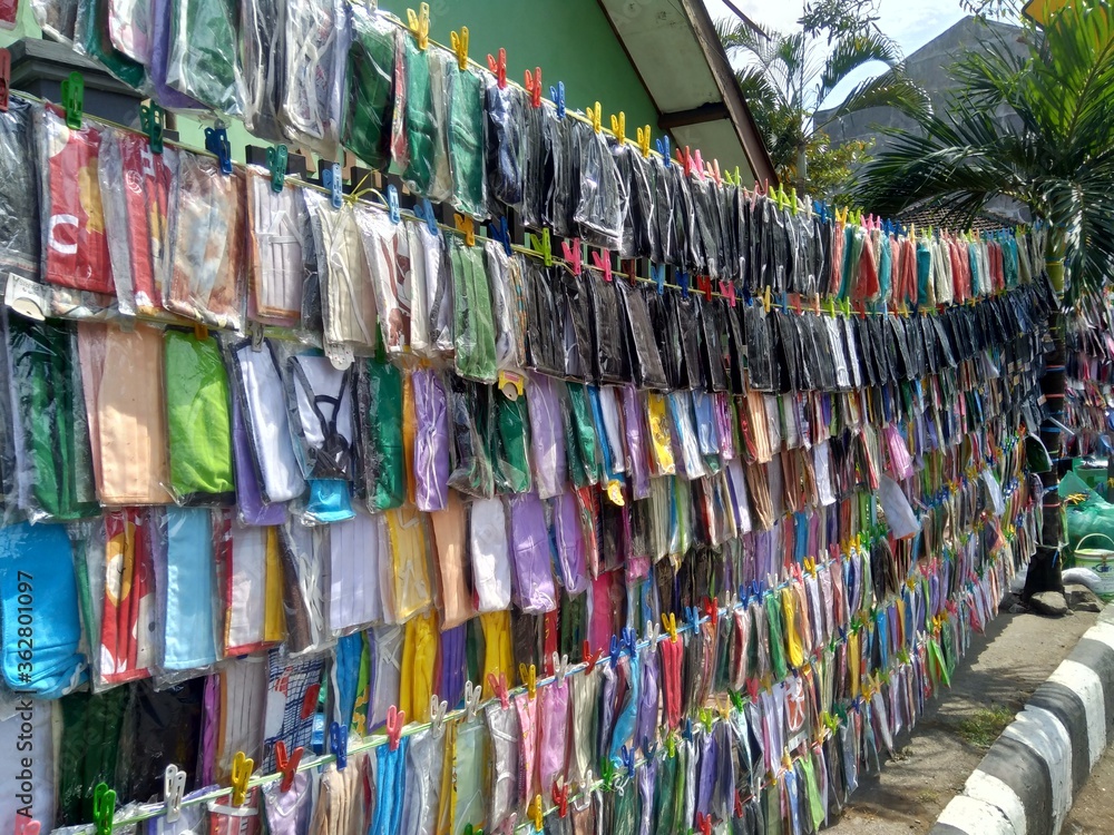 Masker are hanging. Masker are selling in the street during coronavirus pandemic. Masker are hanging. Masker are selling in the street during coronavirus pandemic.