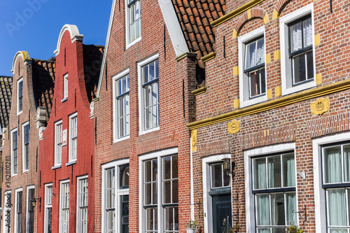 Colorful facades of brick houses in Harlingen, Netherlands