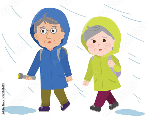 水害で豪雨の中避難する高齢夫婦　イラスト