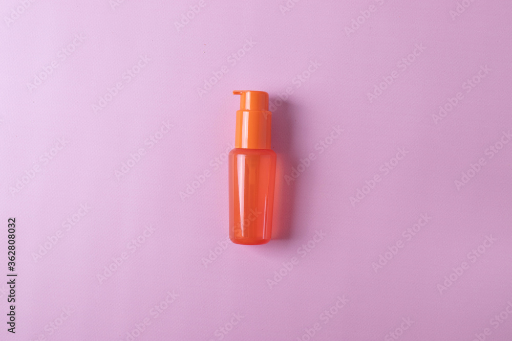 different items of beauty industry on pink background. minimalism style. flat lay different items of beauty industry on pink background. minimalism style. flat lay