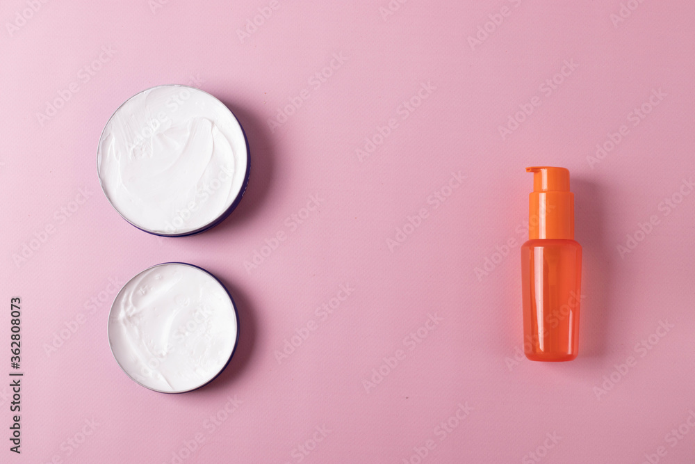 different items of beauty industry on pink background. minimalism style. flat lay different items of beauty industry on pink background. minimalism style. flat lay