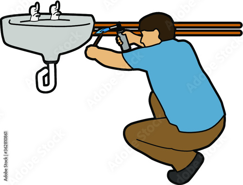 man welding sink pipe