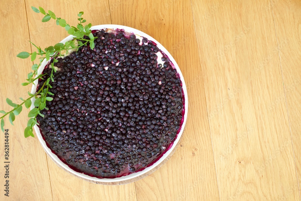 Fresh flat lay of blue berry or bilberry pie Fresh flat lay of blue berry or bilberry pie