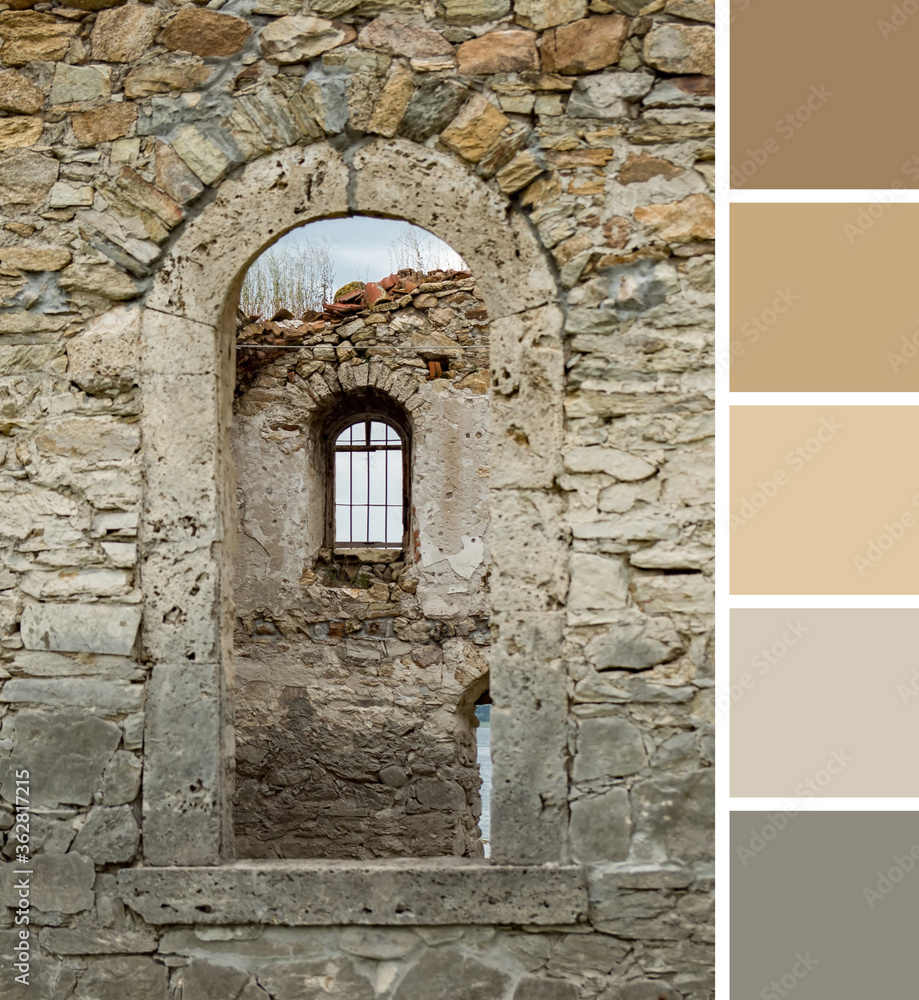 Attractive architectural ornaments, arch of window on stone wall in brown beige grey, ruins of abandoned building. Color palette swatches, natural combination of colors, inspired by ground gamma.