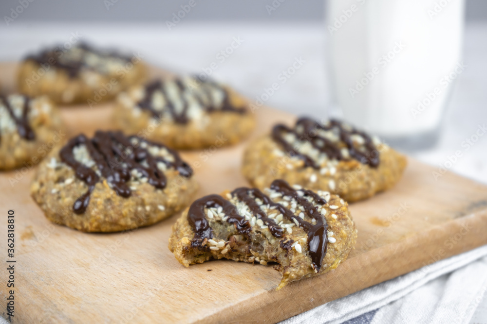 healthy banana oatmeal cookies with chocolate, healthy dessert with milk for breakfast healthy banana oatmeal cookies with chocolate, healthy dessert with milk for breakfast