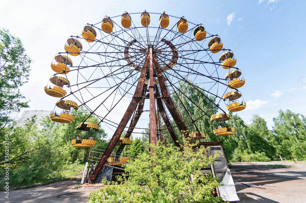 Fun fair, ferris wheel in Prypiat, Chernobyl exclusion Zone. Chernobyl Nuclear Power Plant Zone of Alienation in Ukraine