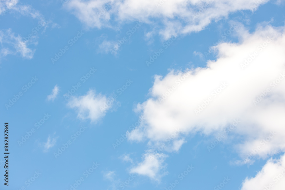 Summers day fluffy clouds with blue sky Summers day fluffy clouds with blue sky