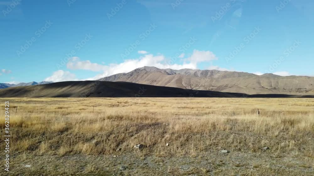 Scene of road trip in the car while moving forward on the beautiful scenic view of South Island New Zealand. Scene of road trip in the car while moving forward on the beautiful scenic view of South Island New Zealand.
