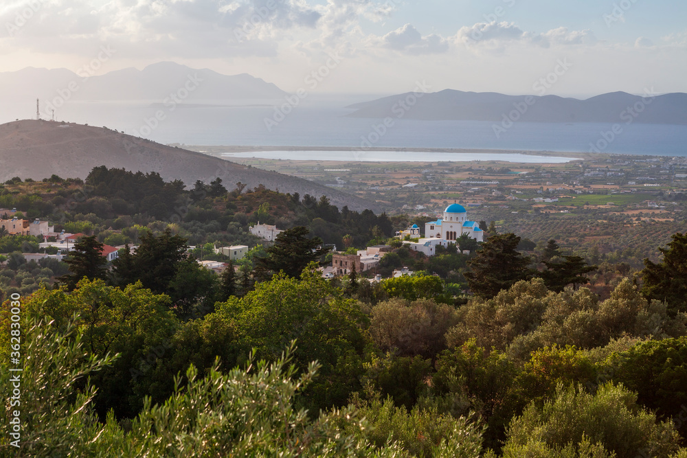 Church in Kos Island at sunset to the surrounding island landscape