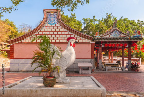November 9, 2014: wind chicken statue in front of General Li Guang-qian Temple at lieyu, kinmen, taiwan. Wind Chicken is a talisman to manipulate the wind and protect local people from evil and pests photo