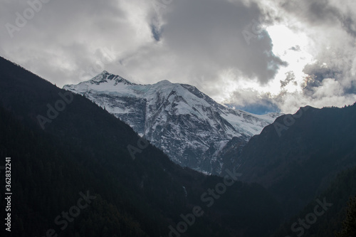 Snow-covered peak trekking Annapurna circuit  Nepal