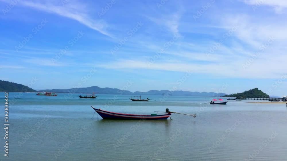 fishing boat on sea in fishing village,Pitak Island,Thailand fishing boat on sea in fishing village,Pitak Island,Thailand