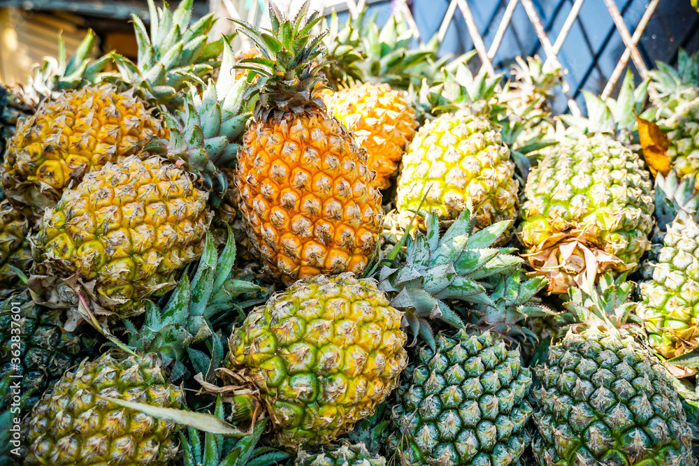 Fresh citrus ripe pineapples pattern background Fresh citrus ripe pineapples pattern background