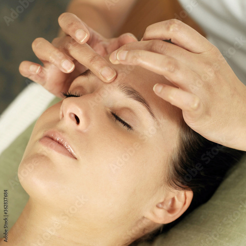 Woman enjoying a head massage