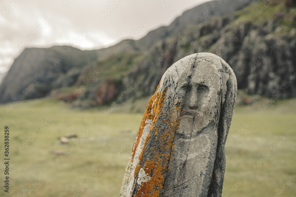 stone depicting a male face ancient Scythian period, The archaeological ...