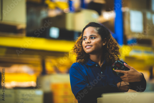 warehouse worker using bar ...