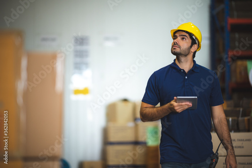 warehouse worker working in...
