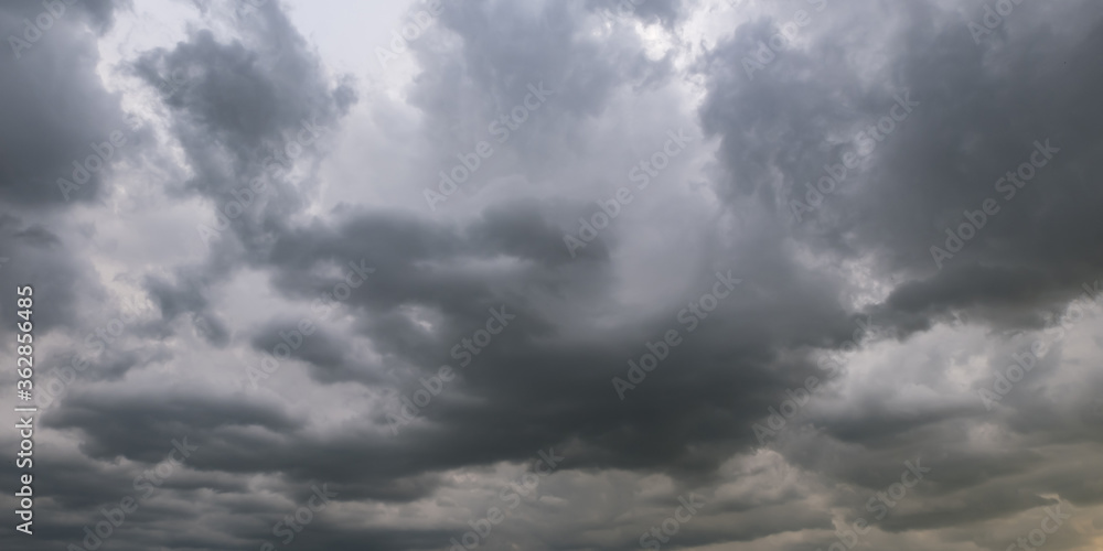 panorama of black sky background with storm clouds. thunder front panorama of black sky background with storm clouds. thunder front