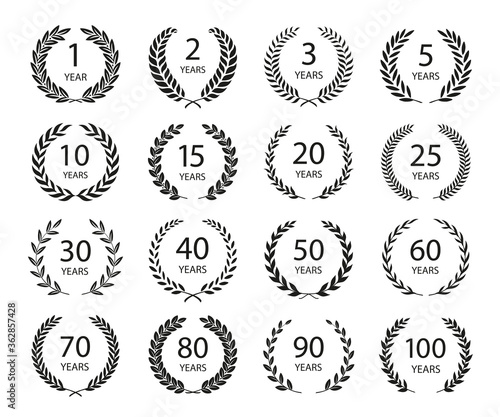 Set of anniversary laurel wreaths. Black and white anniversary symbols. 1, 2, 3, 5, 10, 15, 20, 25, 30, 40, 50,60,70,80,90,100 years. Template for award and congratulation design. Vector illustration.