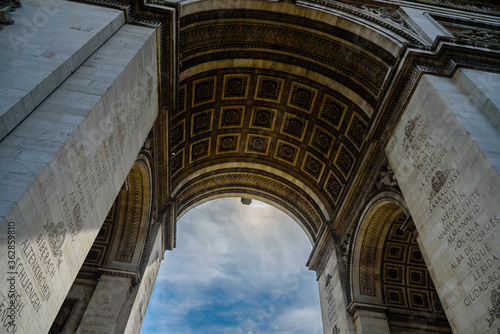 The Arc de Triomphe de l'Étoile ("Triumphal Arch of the Star") is one of the most famous monuments in Paris, France, standing at the western end of the Champs-Élysées.