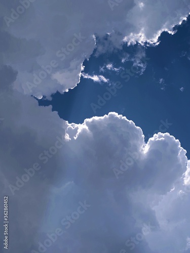 Sun rays shine from the clouds