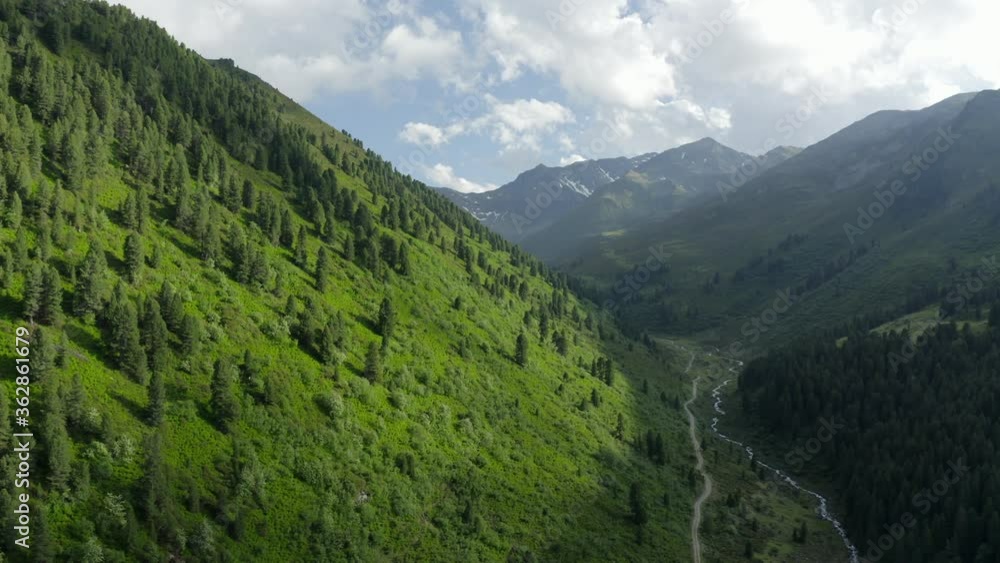 Dramatic aerial view over Austrian Tyrol mountainside valley, summer Dramatic aerial view over Austrian Tyrol mountainside valley, summer