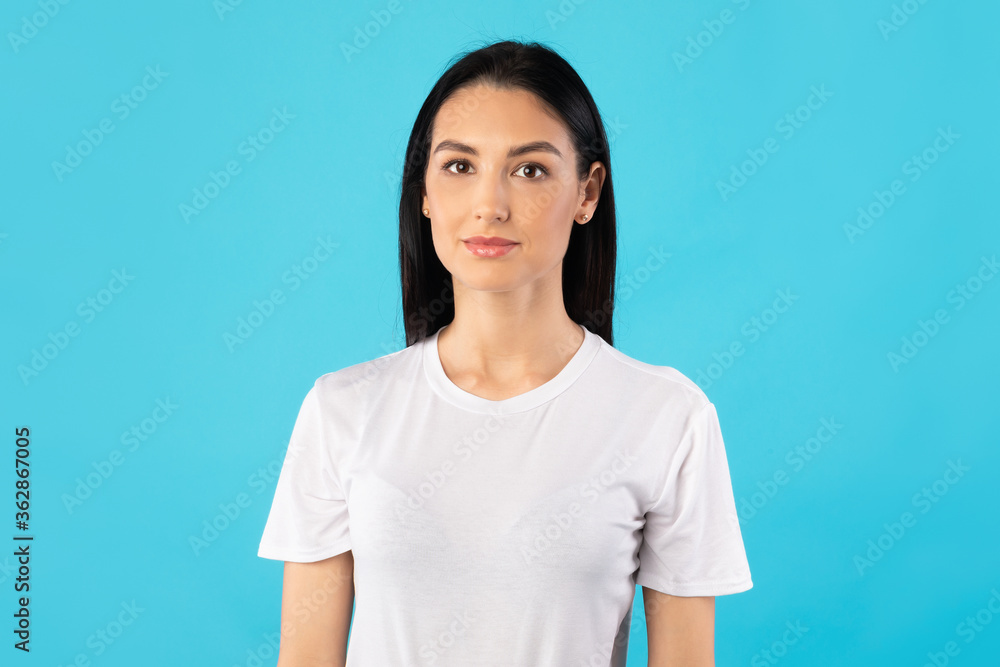 Happy woman posing and looking at camera Happy woman posing and looking at camera
