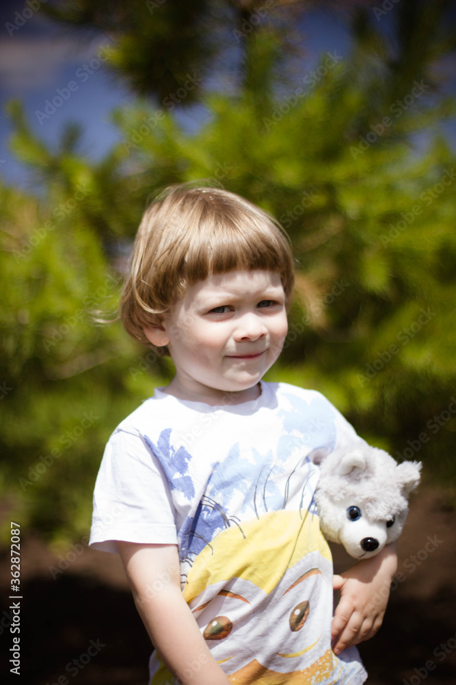 little boy playing with his dog little boy playing with his dog
