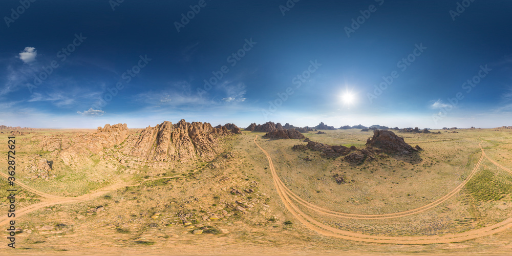 An aerial drone view of Baga Ikh Gazriin Chuluu the largest part of the granite area of Mongolia. 360 degrees panorama