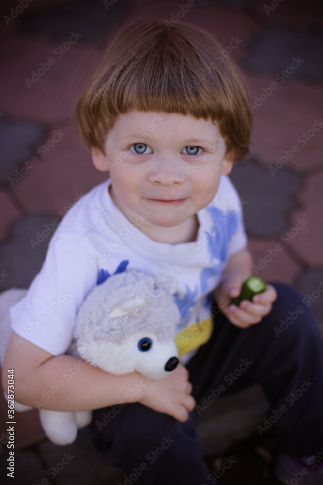 little boy playing with toy little boy playing with toy