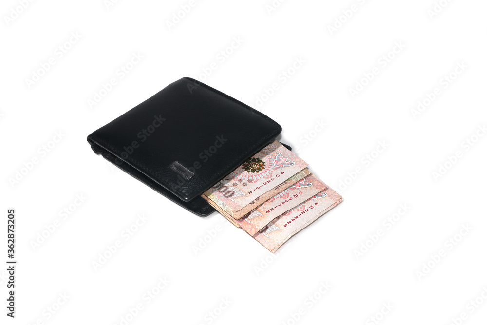 1000 baht banknotes in the wallet of black on a white background. 1000 baht banknotes in the wallet of black on a white background.