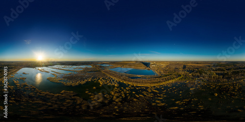 Fototapeta Naklejka Na Ścianę i Meble -  An aerial drone view of the Kohtla-Järve sedimentation basin. The oil shale industry in Estonia is one of the most developed in the world. 360 degrees panorama