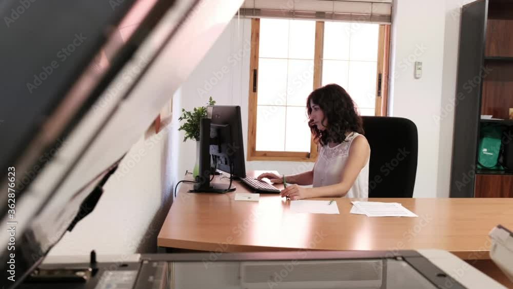 office worker woman in workplace working at computer