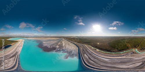 An aerial drone view of the Sedimentary basins of the Eesti Power Plant Baltic. Thermal power plant run on local oil shale. 360 degrees panorama