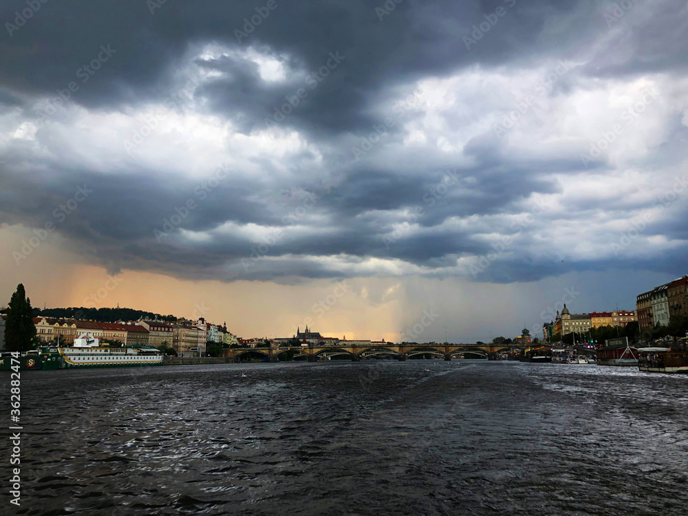 Rain storm above the Castle seen from the Vltava River
