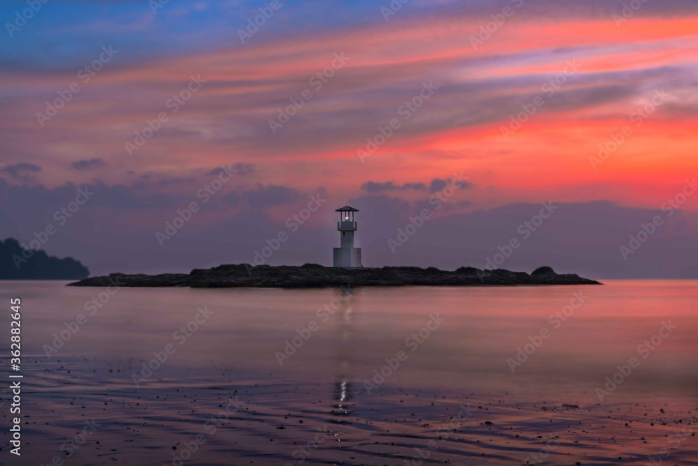 Seascape  sunset twilight sky at Phangnga Province Lighthouse ,Thailand on the coast .