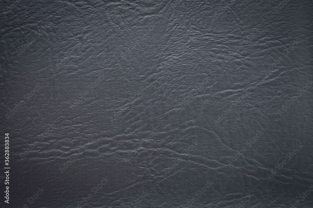 Close-up of Black gray leather texture. Surface of rough abstract dark black matte background. Close-up of Black gray leather texture. Surface of rough abstract dark black matte background.