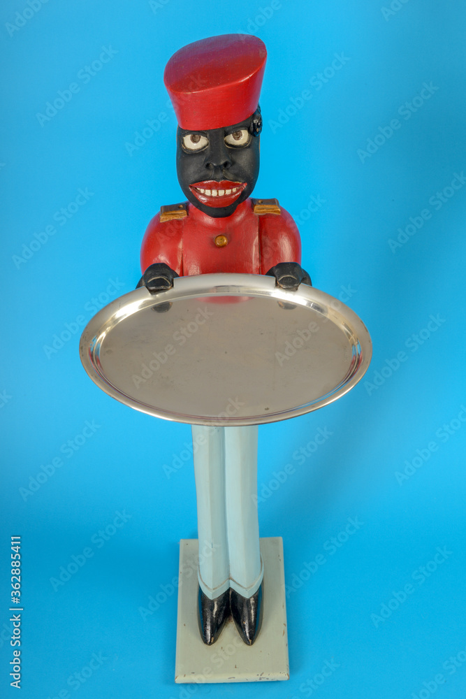 Statue of a black servant with a tray