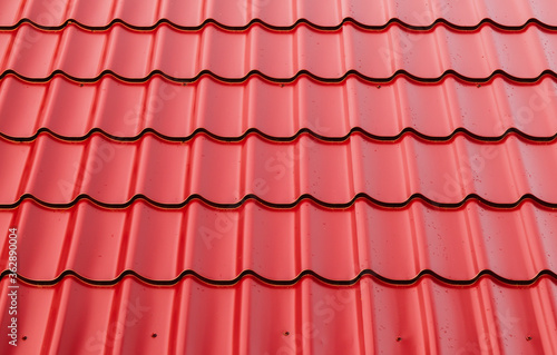 New red metal shingles roof texture, background